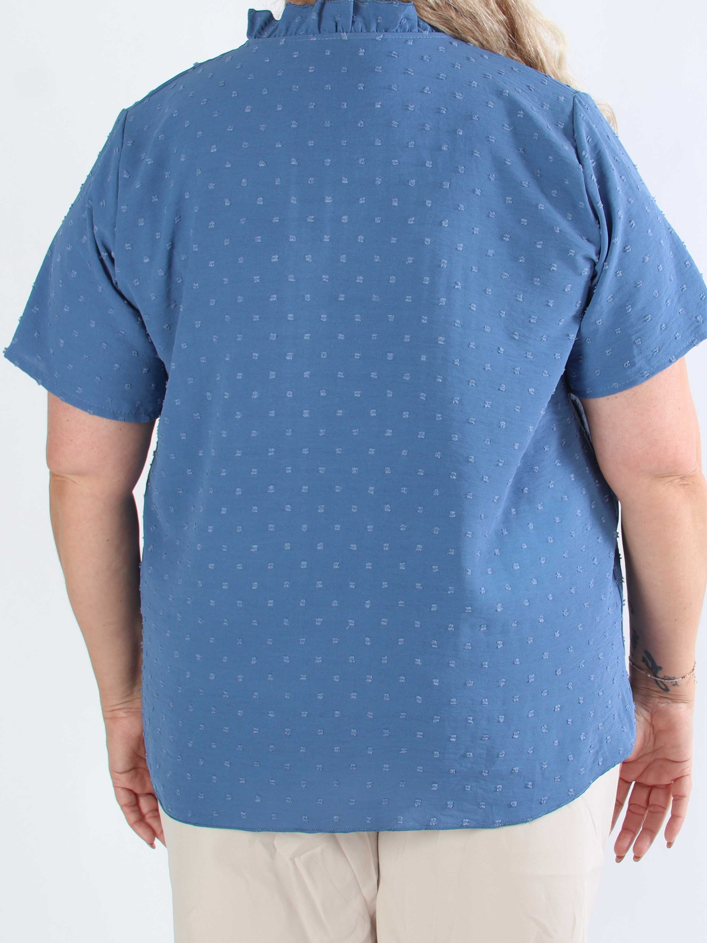 Bloom - Söt tunika i plusstorlek med volangkant och rosett